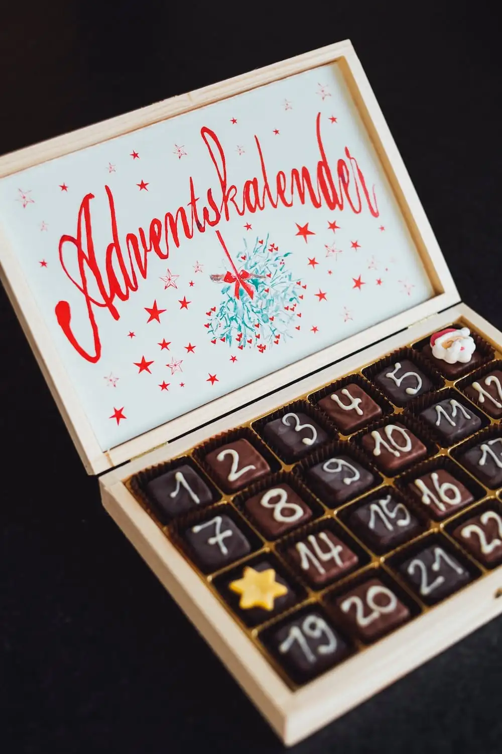 Photo by Markus Spiske on Unsplash advent calendar with chocolates for every day